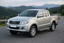 Toyota Hilux 2006–2015 Side steps RedLine V1 (2 stuks, aluminium) foto 1
