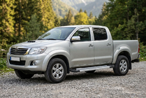 Toyota Hilux 2006–2015 Side steps New Vision Grey (2 stuks, aluminium) foto 1