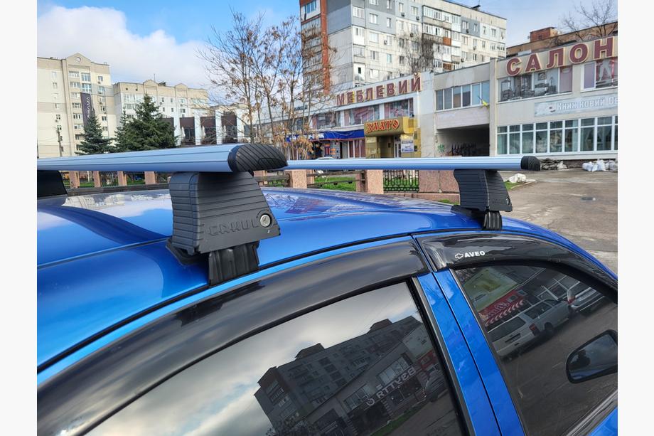 Chevrolet Aveo T250 2005–2011 Dakdrager-dwarsbalken voor glad dak (2 stuks, Asaf V4) Image