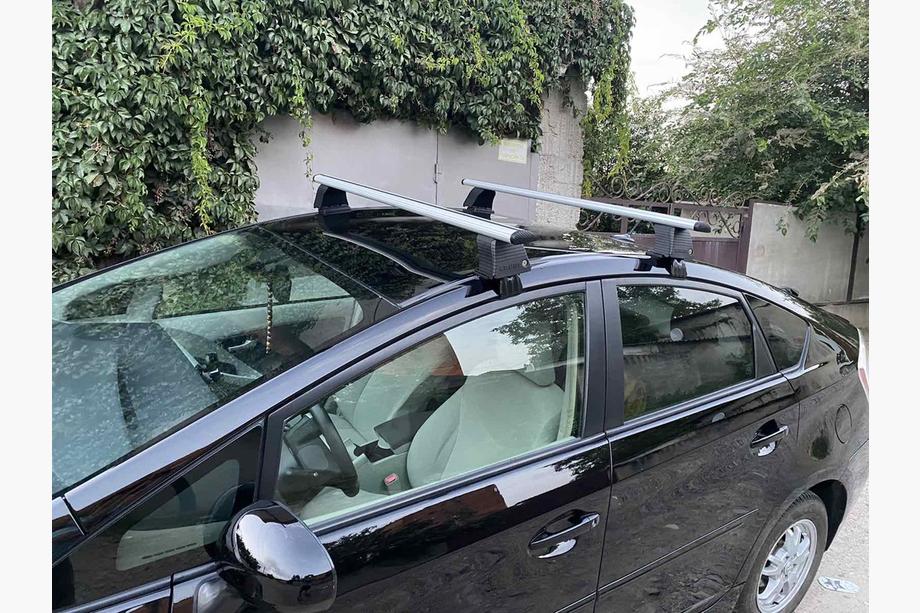 Toyota Prius 2009–2015 Dakdrager-dwarsbalken voor glad dak (2 stuks, Asaf V4) Foto 1
