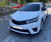 Toyota Corolla 2013–2019 Voorbumper lipspoiler LIP (zwart) foto 1