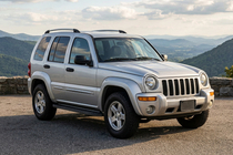 Jeep Cherokee/Liberty 2002–2007 Boshpore Black side steps (2 stuks, aluminium) foto 1