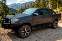 Toyota Hilux 2006–2015 Dakar zwarte side steps V1 met verlichting (2 stuks, metaal) foto 1
