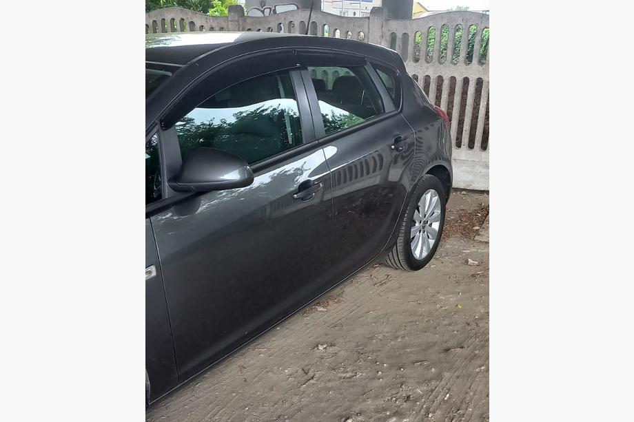 Opel Astra J 2009–2015 Raamloze winddeflectoren HB/SD (4 stuks, Sunplex Sport) Foto 2