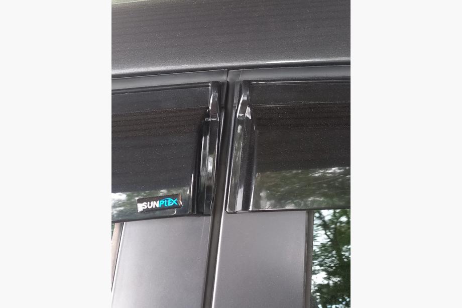 Opel Astra J 2009–2015 Raamloze winddeflectoren HB/SD (4 stuks, Sunplex Sport) Foto 3