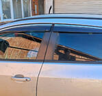 Opel Astra J 2009–2015 Raamwinddeflectoren met chromen strip HB/SD (4 stuks, Sunplex Chrome) foto 1