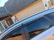 Opel Astra J 2009–2015 Raamwinddeflectoren met chromen strip HB/SD (4 stuks, Sunplex Chrome) foto 3