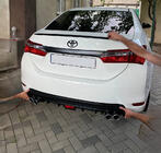 Toyota Corolla 2013–2019 LIP-spoiler (Sunplex, zwart) (118 cm * 6,4 cm) foto 2