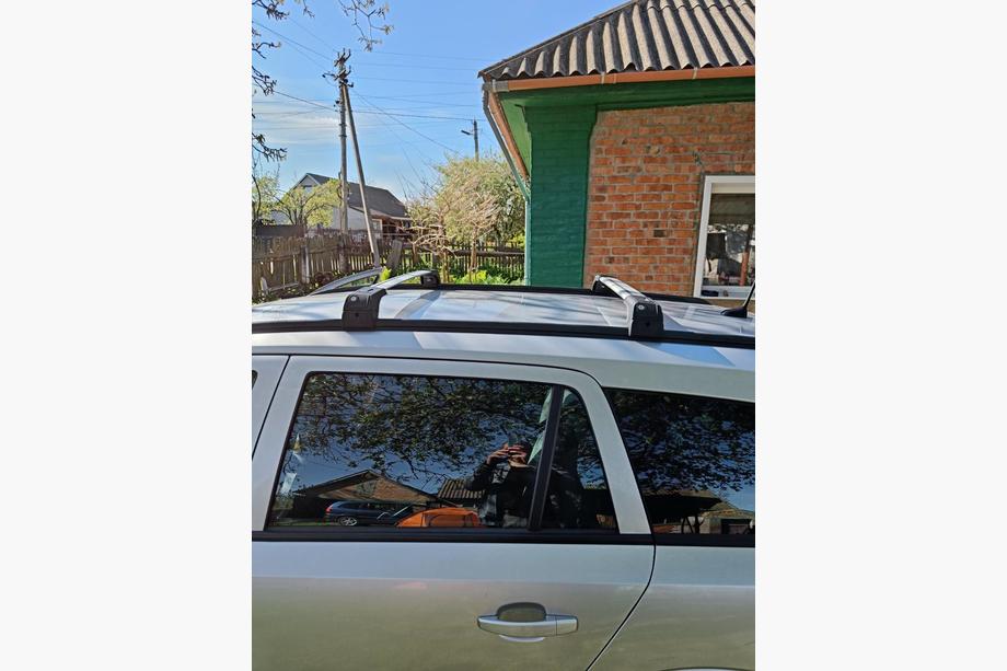 Opel Astra H 2004–2013 Dwarsdragers voor geïntegreerde dakrails, afsluitbaar Skybar V2 (2 stuks) Grijs Foto 12