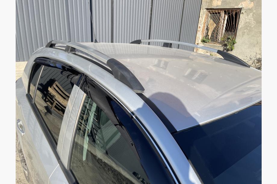 Opel Astra H 2004–2013 Aluminium dakrails (HB, chroom) Foto 12